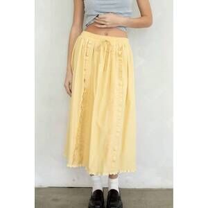 NEW THINGS BETWEEN cotton apron skirt in butter yellow
